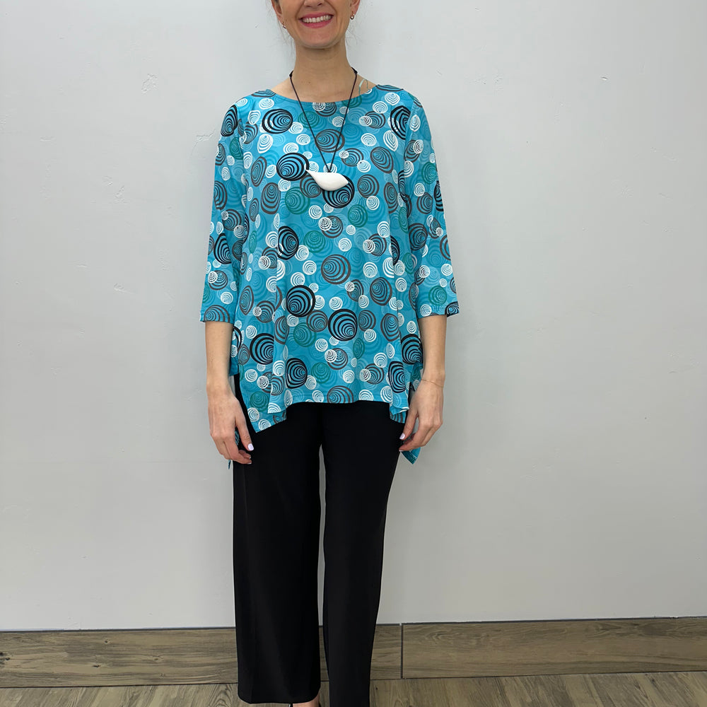 
                  
                    Teal Swirls 3/4 Sleeve Shark-bite Tunic
                  
                