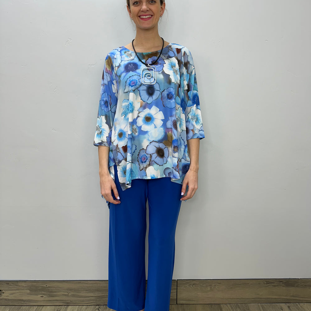 
                  
                    Blue Floral 3/4 Sleeve Shark-bite Tunic
                  
                