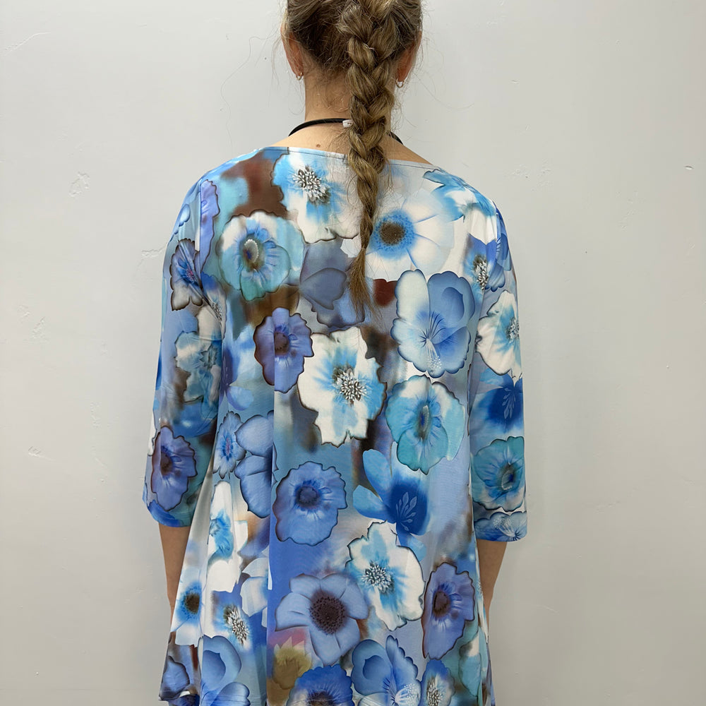 
                  
                    Blue Floral 3/4 Sleeve Shark-bite Tunic
                  
                