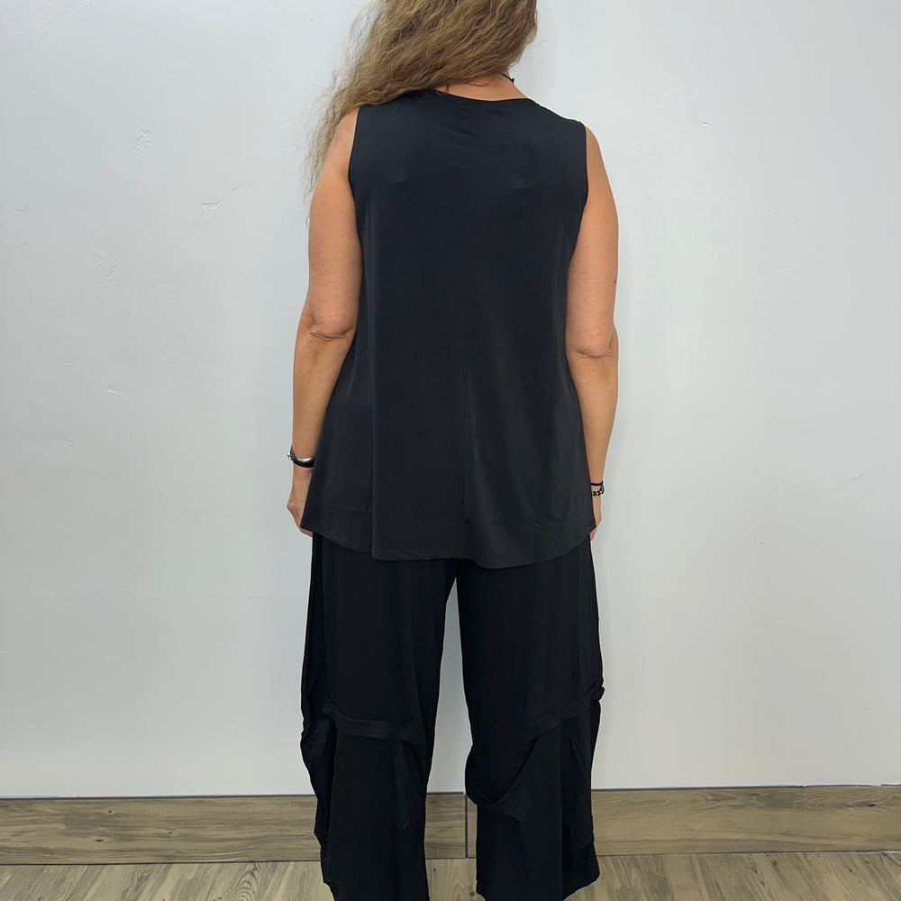 
                  
                    Black Solid Sleeveless Desa Tunic
                  
                