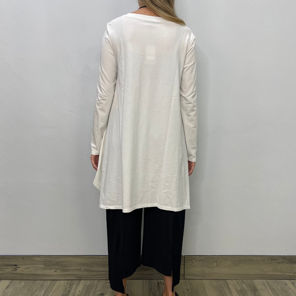 
                  
                    Ecru White V Neck Swing Tunic
                  
                