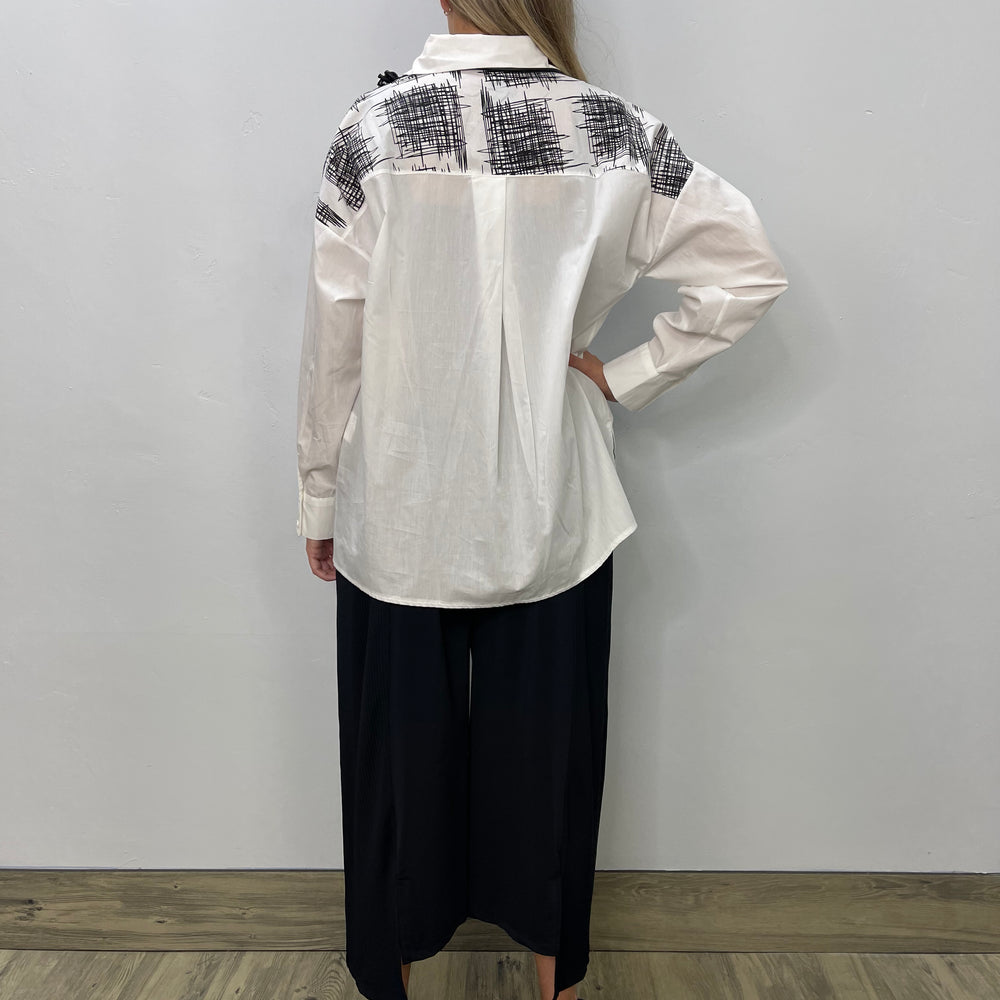 
                  
                    White Pattern Asymmetric Button Up Blouse
                  
                