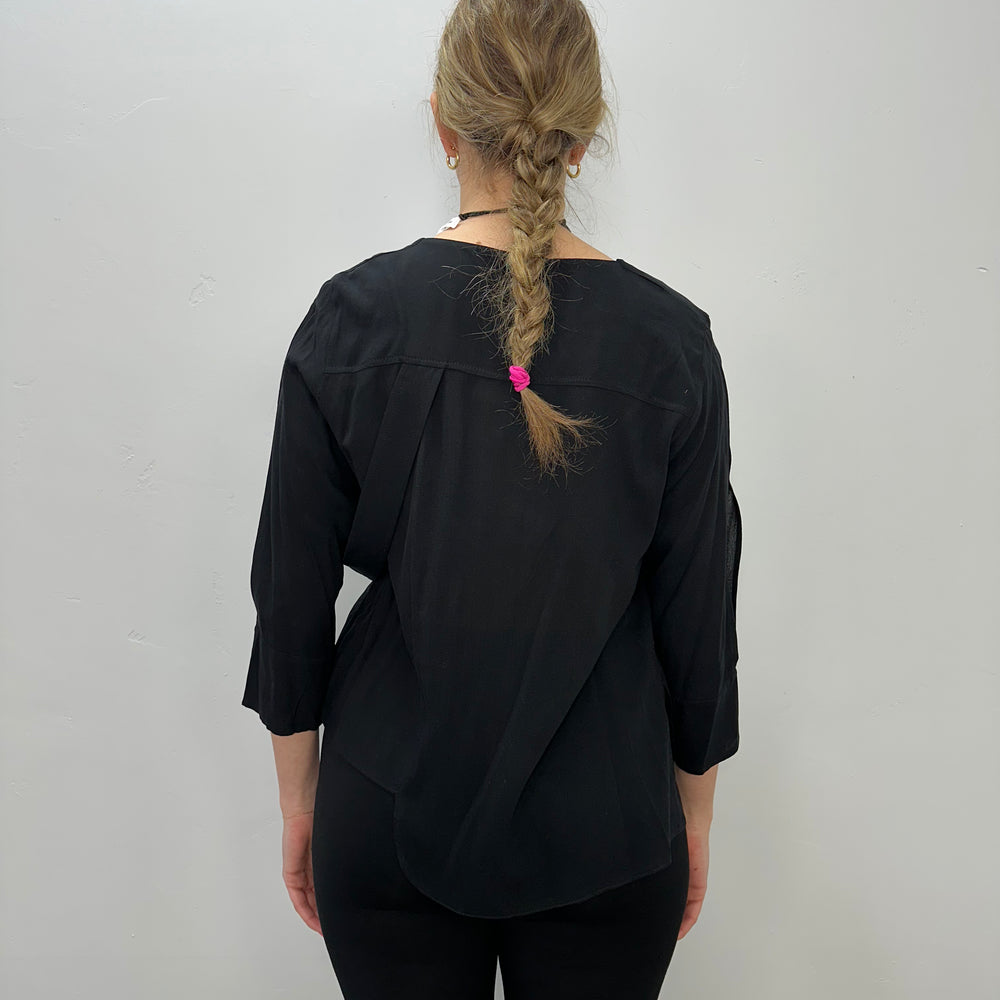 
                  
                    Black 3/4 Sleeve Top with Open Arm
                  
                