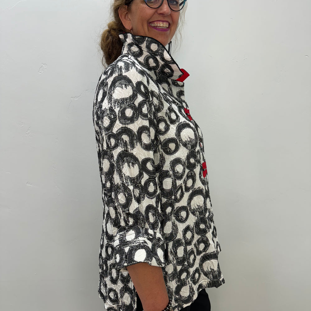 Black and White Pattern Jacket with Red Accent