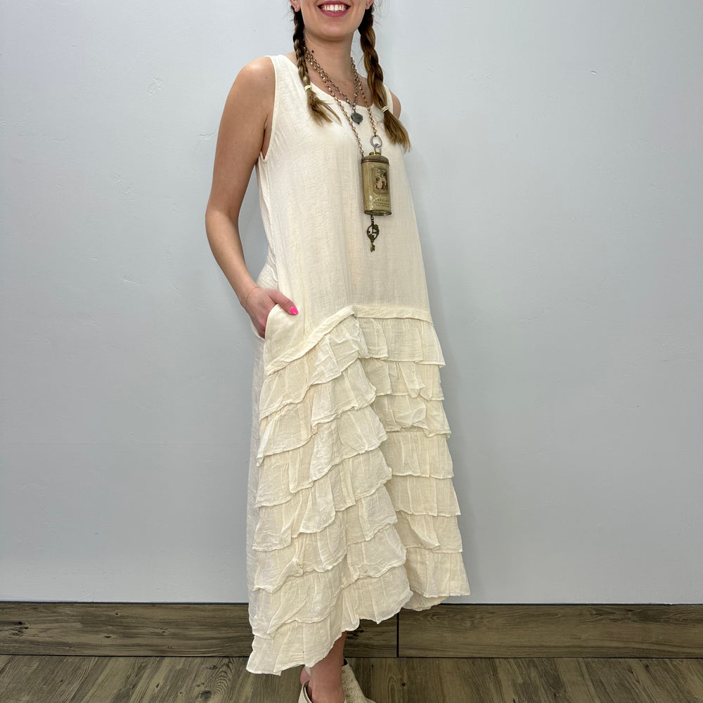 
                  
                    Cream Sleeveless Long Dress with Ruffle Accent and Pockets
                  
                