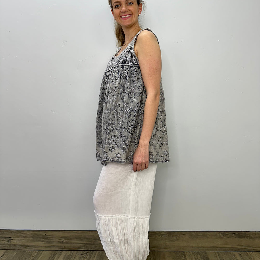 
                  
                    Grey Sleeveless Tank with Embroidered Design
                  
                