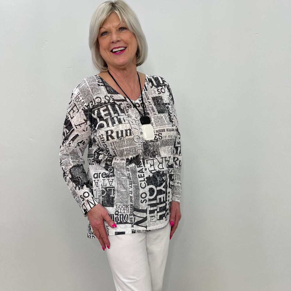 
                  
                    3/4 Sleeve Newspaper Tunic
                  
                