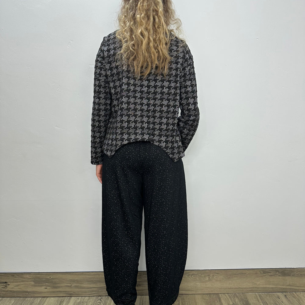 
                  
                    Gray and Black Pattern Long Sleeve with Red Accents
                  
                