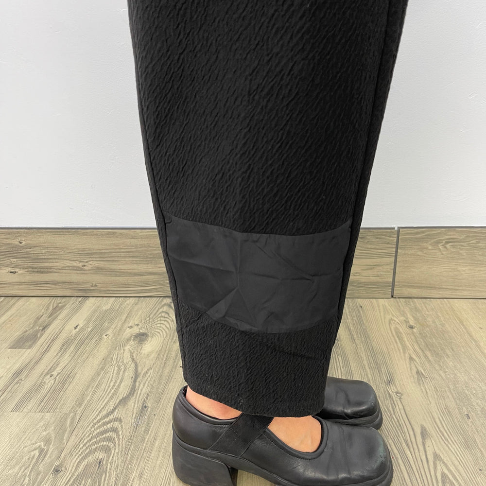 
                  
                    Black Pant with Square Accent
                  
                